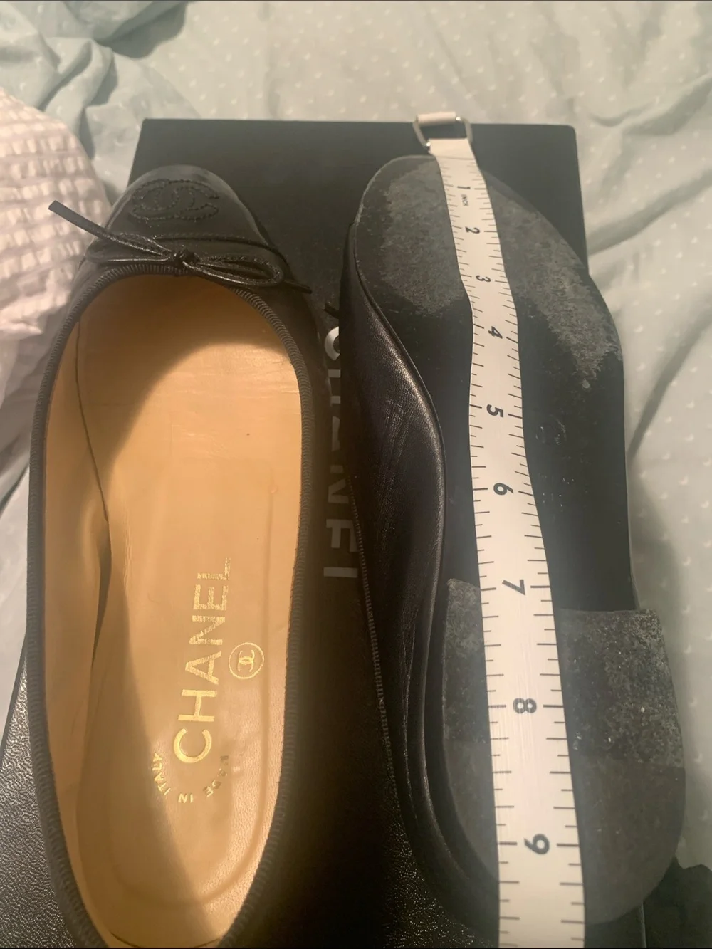 CHANEL Black Leather Cap-Toe CC Ballet Flats